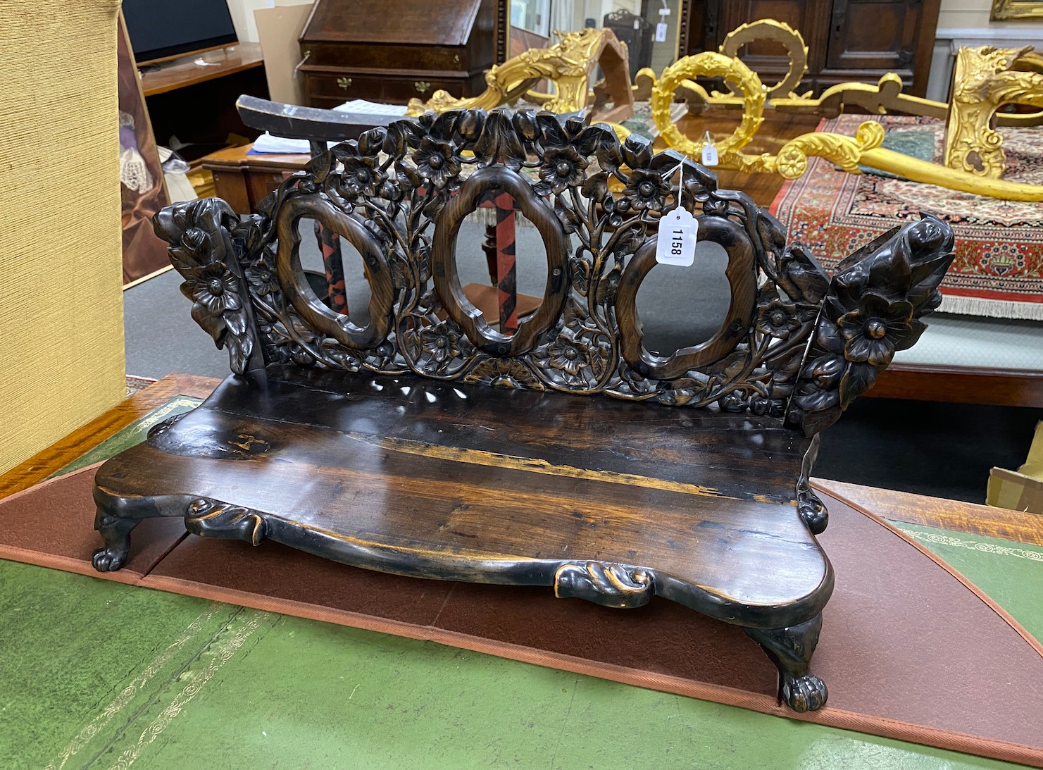 A carved hardwood Chinese stand, width 83cm